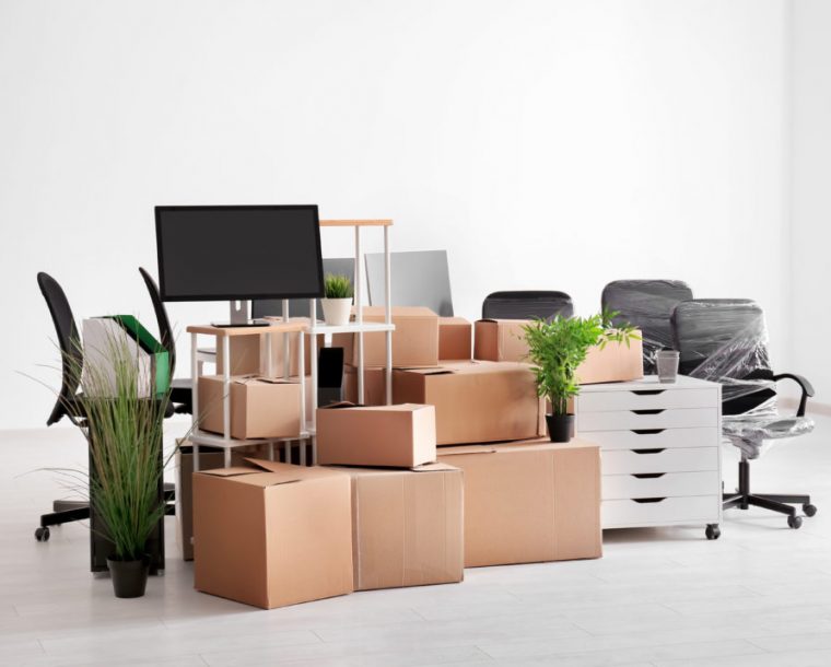 Carton boxes with stuff in empty room. Office move concept